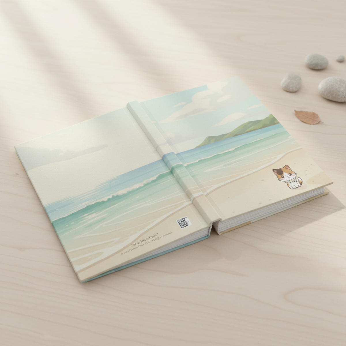 Quiet Morning by the Sea with Pachi Journal open to show the wraparound beach cover design